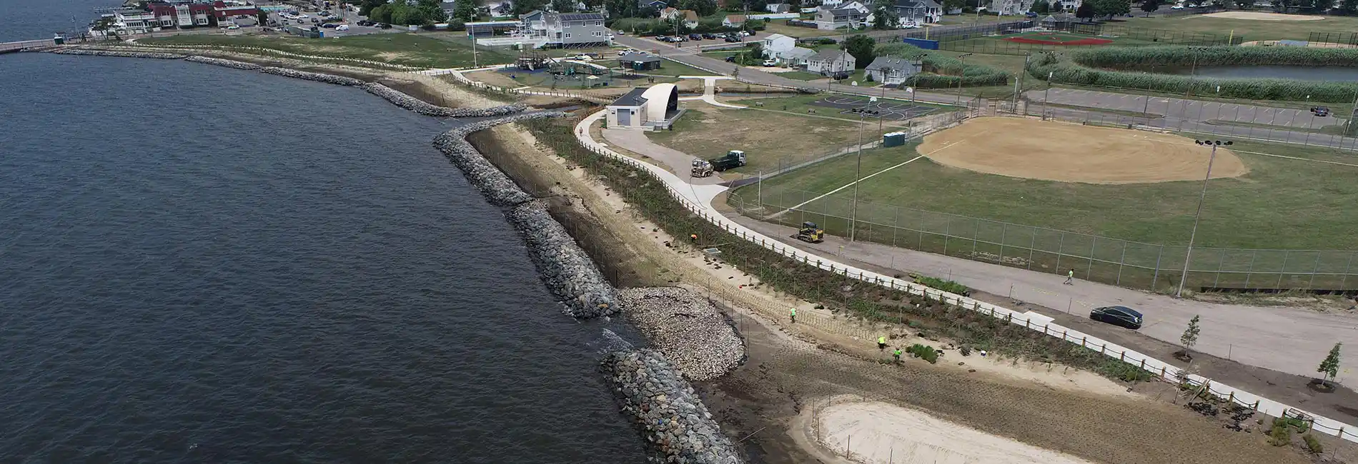 Shorefront Park’s resilient shoreline features walking trails, and amphitheater, and active recreation.