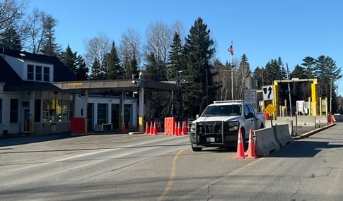 A truck moving through the Coburn Gore Border Inspection Station.