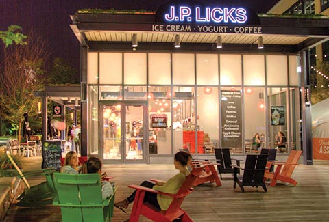 Visitors enjoy outside seating at Assembly Row.