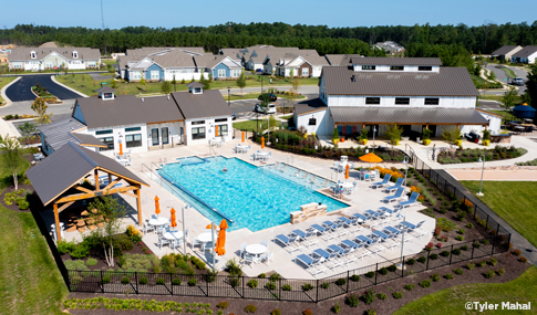 Aerial view of the back of the Chickahominy Clubhouse and pool. 