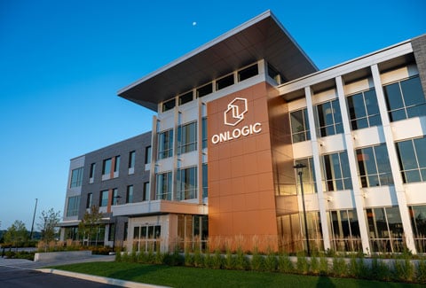 Front of new commercial building with company name—“OnLogic”—and logo.