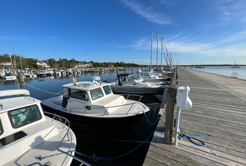 Boats docked along the Bellport Village Marina.