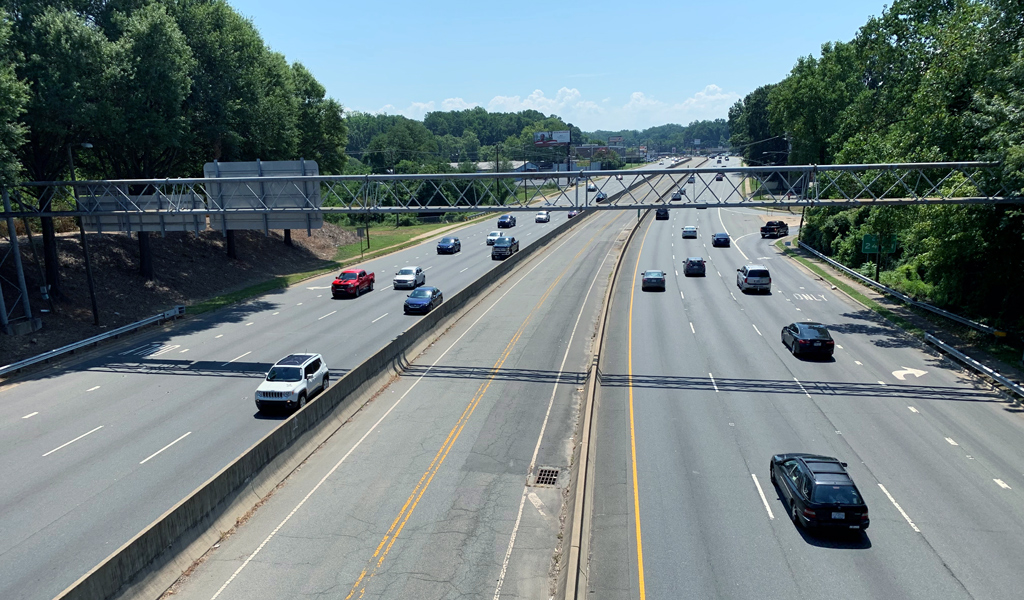 Overlooking busy Independence Boulevard with multiple lanes of car traffic.  