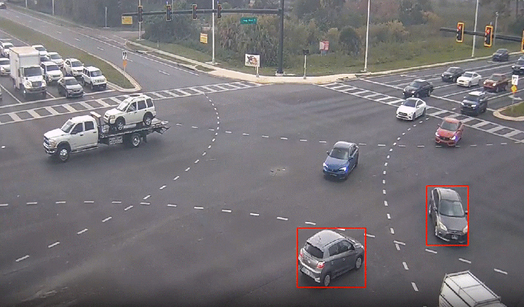 An aerial view of a near-miss detected within a roadway intersection.