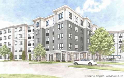 Architectural rendering of a modern multi-story apartment building with landscaped surroundings and parked cars.