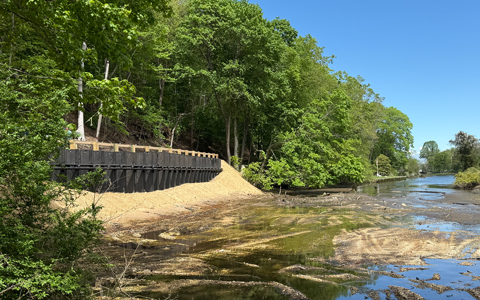 Newly constructed road next to waterfront.