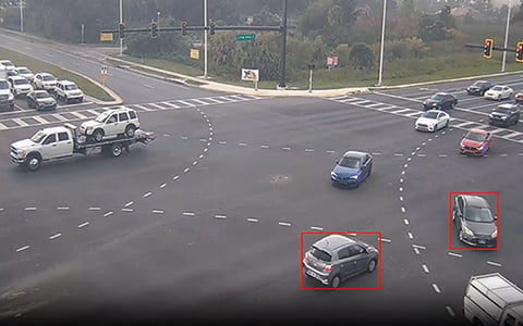 An aerial view of a near-miss detected within a roadway intersection.