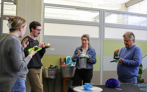 Four Richmond VHBers gather to eat cake as part of the celebration.