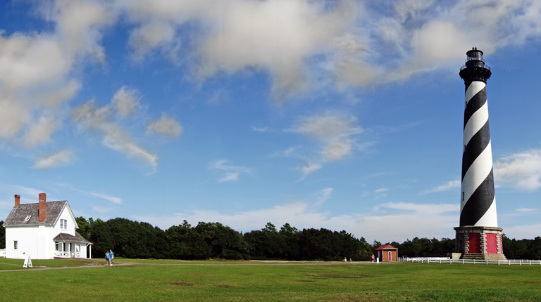 Visitors spend time at the Cape Hatteras Light Station site.