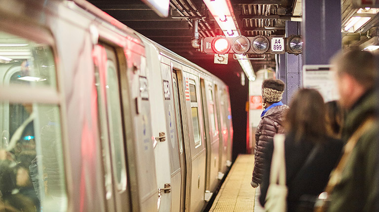 People waiting for the subway in New York City. 