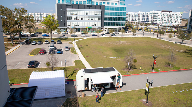 Mobile REACH Hub is launched at UCF Downtown event as seen from above.