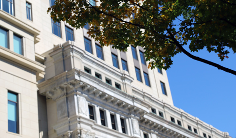 The historic facade from 1912 in contrast with the modern 2023 facade.