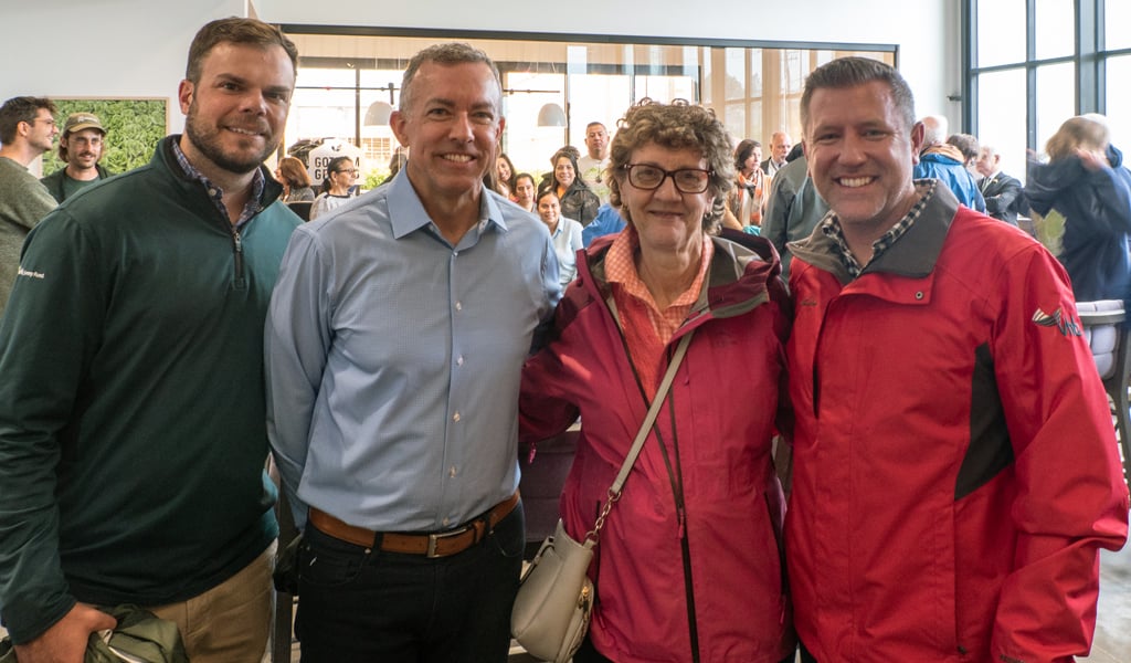 VHB’s Joe Wanat, Shawn Giatas, and Justin Dufresne, with landscape architect Elena Pascarella of Landscape Elements, LLC, at the ribbon cutting inside Gotham Greens.