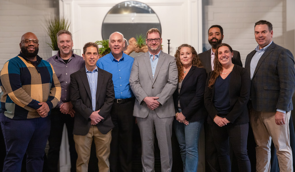 From Left to Right: Vaughn Murria, Glenn Kirkpatrick, Joe Hanrahan, Joe Pizzurro, Josh Hanrahan, Leanne Hoffman, Clinton Miller, Courtney Riley, and Brian Perry.