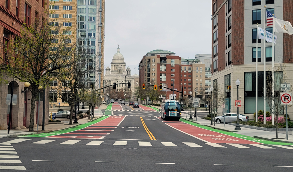 Multi-lane city street in Providence, Rhode Island, with prominently marked bus and bike lanes.