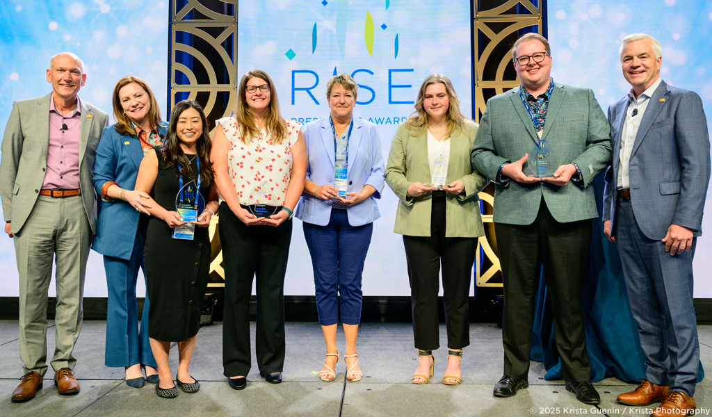 VHB's 2025 Rising Professionals of the Year with leadership at the Partner's Event in Atlanta.