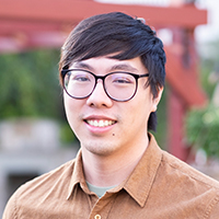 A person wearing a brown shirt.
