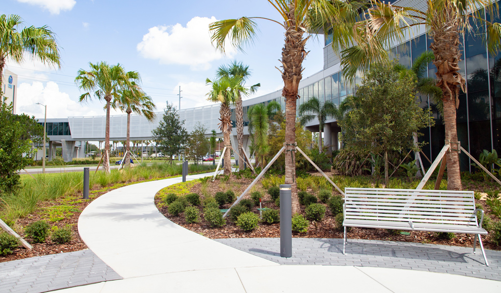 A pedestrian bridge connects the new hospital tower to the main building. 