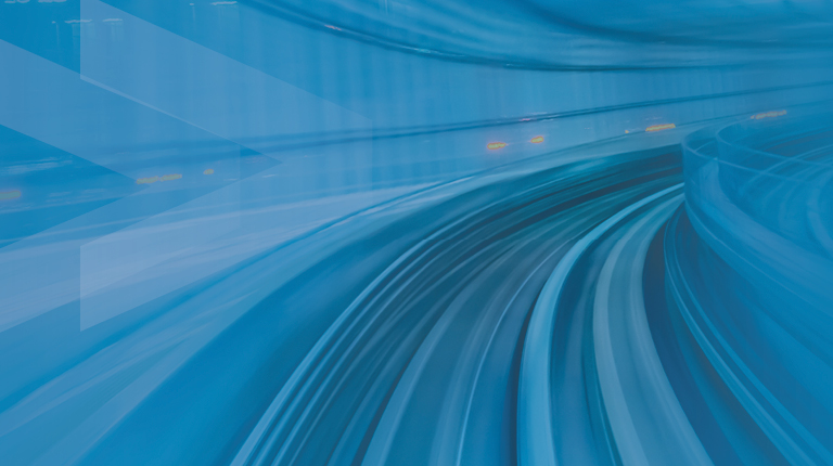 A road in a tunnel with blue lines to demonstrate movement.