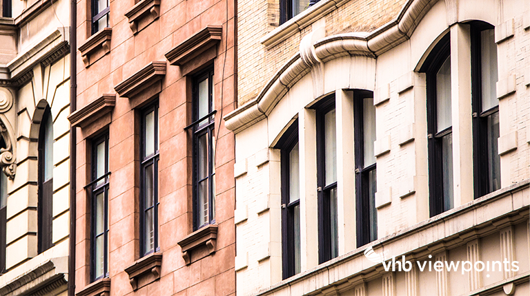 Architectural details on vintage brick apartment building in New York City